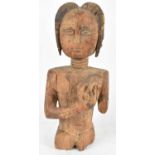 TRIBAL ART; an African carved wooden female figure (af), height 39cm.
