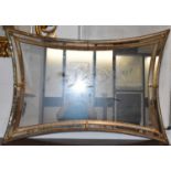 A reproduction Venetian style wall mirror, 77 x 102cm.