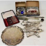 A quantity of assorted silver plated items including a salver, a three piece cruet, flatware, etc