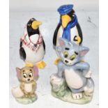 WADE; two figures of Tom and Jerry, also two salt and pepper penguins.