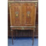 A reproduction inlaid cocktail cabinet with pair of doors above two frieze drawers, width 85cm,