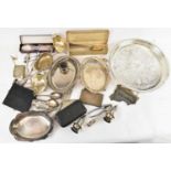 A quantity of silver plated items, including cigarette cases, sauce boats, trays and flatware, etc.