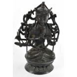A Chinese bronze figure of a seated Buddha, height 21cm.Condition Report: There are a few losses