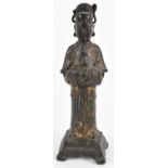 A Chinese patinated metal figure of Guanyin standing, height 25cm.