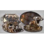 A quantity of assorted plated items including two oval galleried trays, two other trays, and various