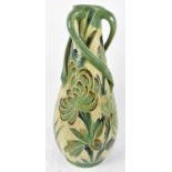 CH BRANNAM; a large Barum ware vase, marked JD 1893 to base, height 50cm (restorations).Condition