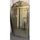 A large decorative Venetian style wall mirror, 180 x 86cm.Condition Report: Minor losses and