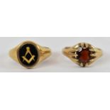 A 9ct yellow gold Masonic ring and a 9ct yellow gold garnet set ring, both approx size V, combined