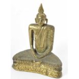 A Ceylonese (Sri Lanka) gilt bronze figure of a seated Buddha, height 11.5cm.