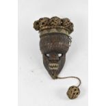 TRIBAL ART; a Democratic Republic of the Congo Salampasu mask with rattan hair, height of mask 34cm,