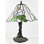 A Tiffany style lamp, with coloured glass shade, height 54cm.