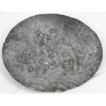 An Indian slate dish with relief decoration, diameter 14.5cm.