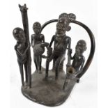 TRIBAL ART; a West African bronze group, probably Ashanti, depicting a chief and other figures,