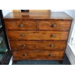 An early 19th century mahogany chest of two short and three long drawers on bracket feet, width