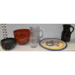 A Studio Glass bowl, signed to base, diameter 14cm, a larger orange glass bowl, diameter 20cm, a