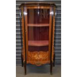 A reproduction French style inlaid vitrine with serpentine front and gilt metal mounts, width approx