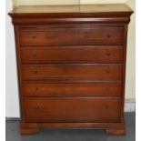 A reproduction chest with cushion drawer above five further drawers, width 98cm, height 112cm.