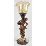 A spelter figural table lamp, with glass shade, height 56cm.