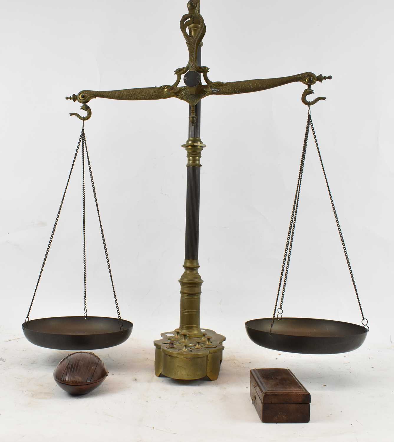 A set of brass balance scales with weights and a further cased set of weights, height of scales