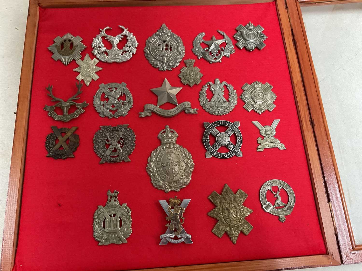 A framed and glazed display of Scottish regiment cap badges, including Highland Regiment, The - Image 2 of 8