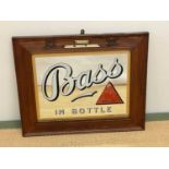 BASS; an original advertising mirror in oak frame with etched detail and bearing plaques