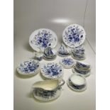 COALPORT; a quantity of 'Cairo Blue' porcelain dinnerware.