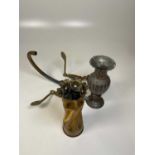 A set of brass mixer taps, Trench Art vase and decorative vase