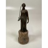 THEODORE ALEXANDER; a bronze statue of a Greco Roman goddess mounted on a circular marble