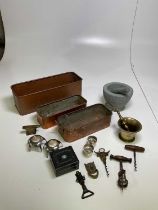 A quantity of copper and brass items, to include copper troughs, corkscrews, brass pestle and