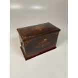 An Edwardian rosewood and satinwood inlaid travelling writing box, the hinged lid set with two dip