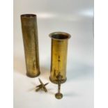Trench Art comprising of two artillery shells and bullets modelled in the form of a cross (4)