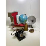 A quantity of collectors' items comprising a bakelite telephone, a globe on teak base, a wooden pond