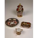 ROYAL CROWN DERBY; an 'Old Imari' 1128 hexagonal jar and cover, a 1128 small trinket dish, a 2451