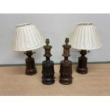 Two pairs of decorative table lamps, one with pleated shades, height 49cm.