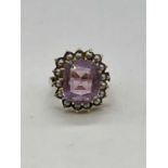 A 9ct yellow gold seed pearl and pale amethyst large dress ring, size M, approx. 9.4g.