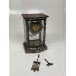 A late 19th century French gilt brass and champleve enamel, four glass mantel clock with eight day