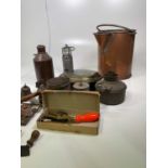 A group of metalware including a copper warming pan, copper jug, etc.