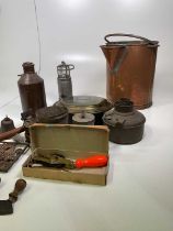 A group of metalware including a copper warming pan, copper jug, etc.