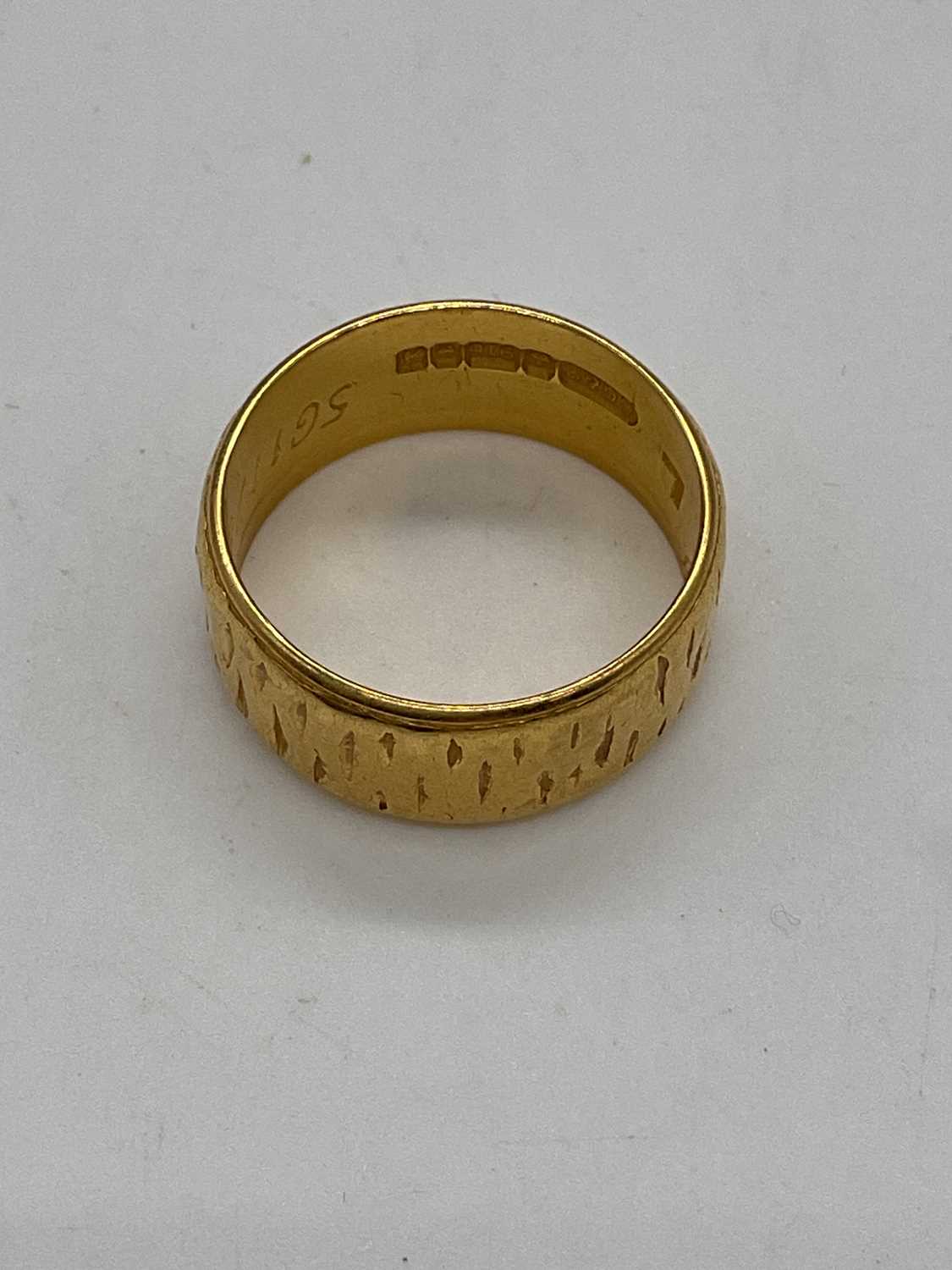 A 22ct yellow gold wedding band with engraved detail and inscription to the inner band, size K 1/ - Image 3 of 4