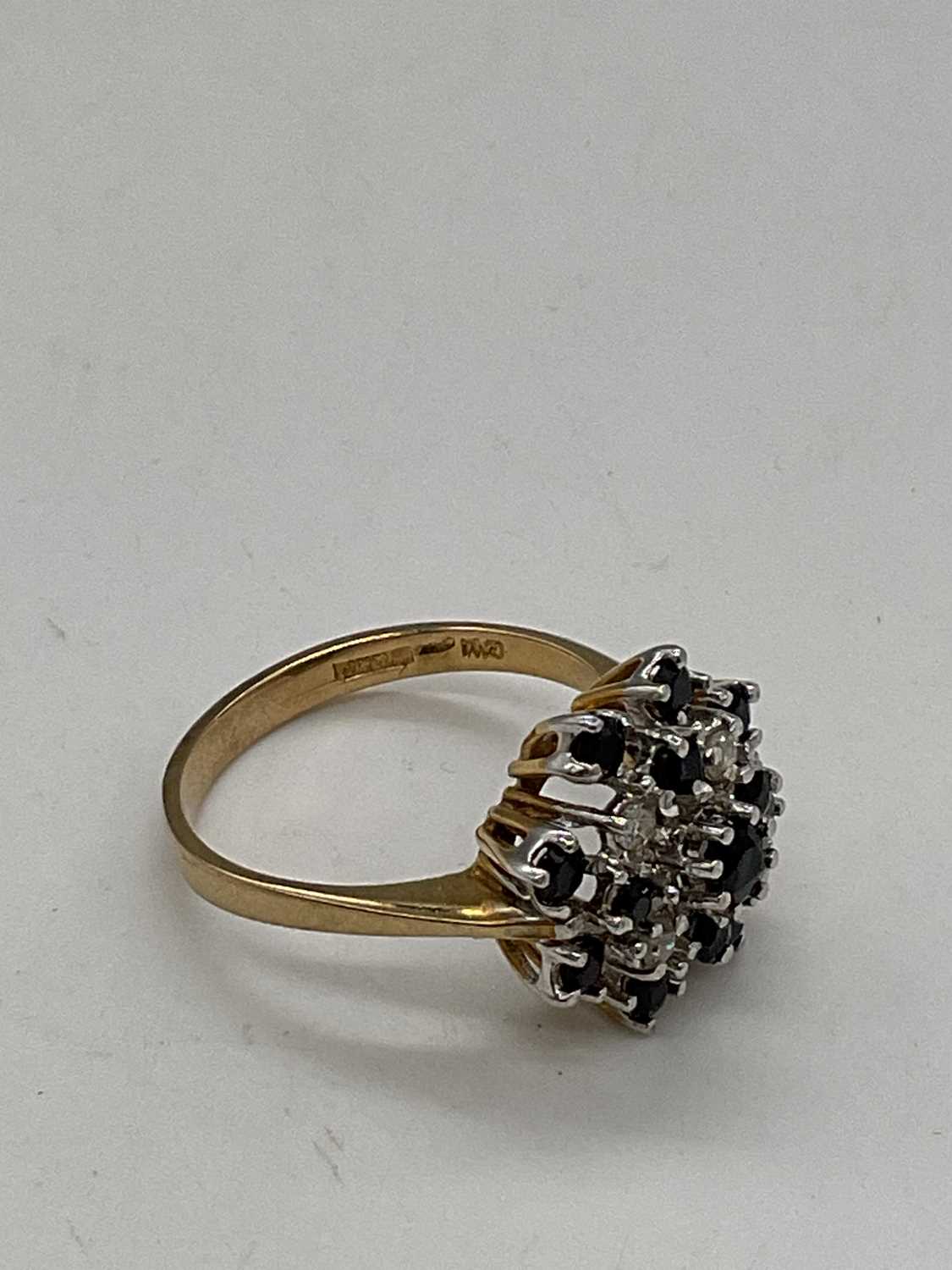 A 9ct yellow gold sapphire and diamond stepped floral cluster ring, size Q, approx. 3.9g. - Image 3 of 4