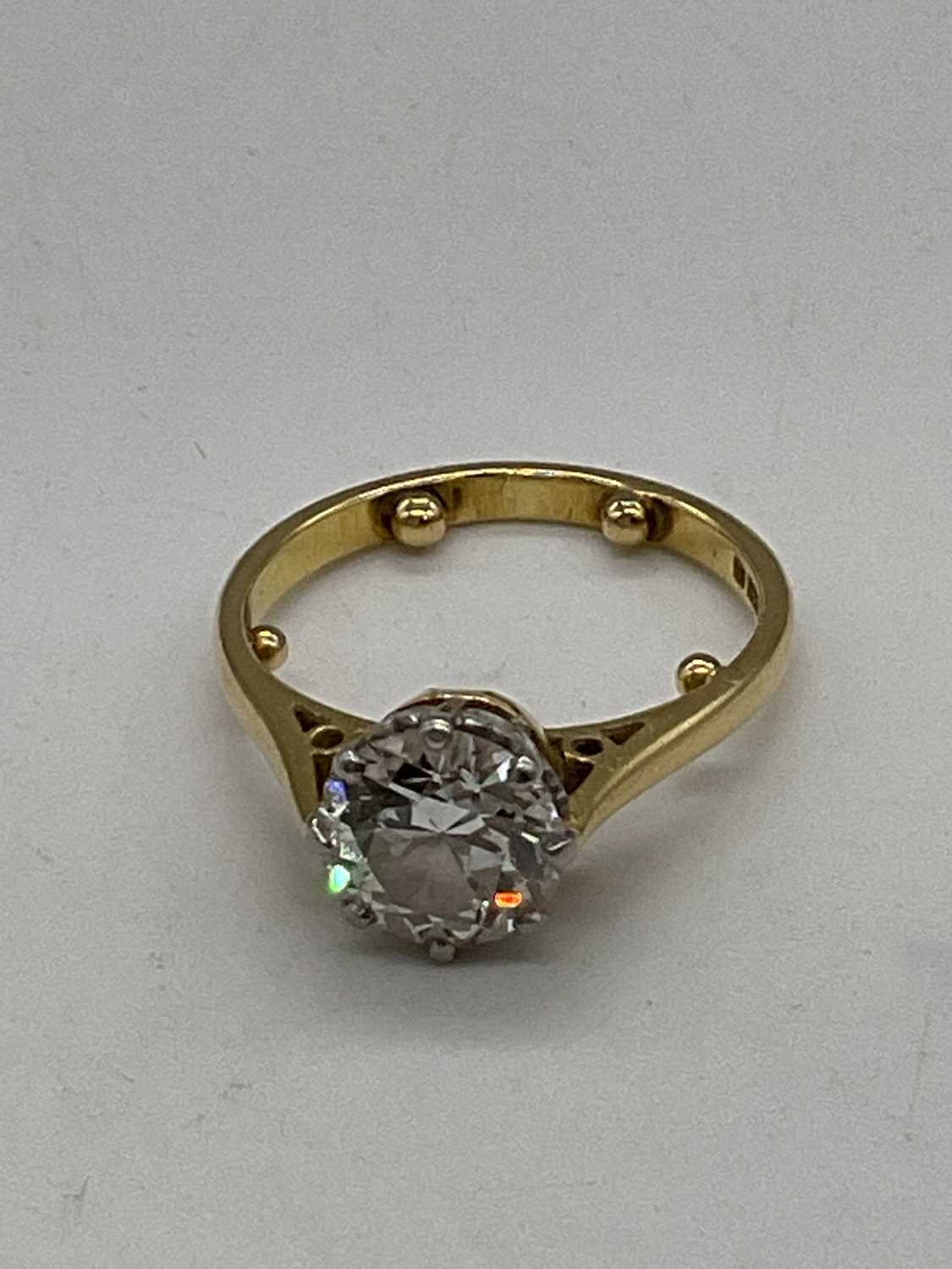 An 18ct yellow gold diamond solitaire ring, the eight claw set round brilliant cut stone approx. - Image 3 of 5