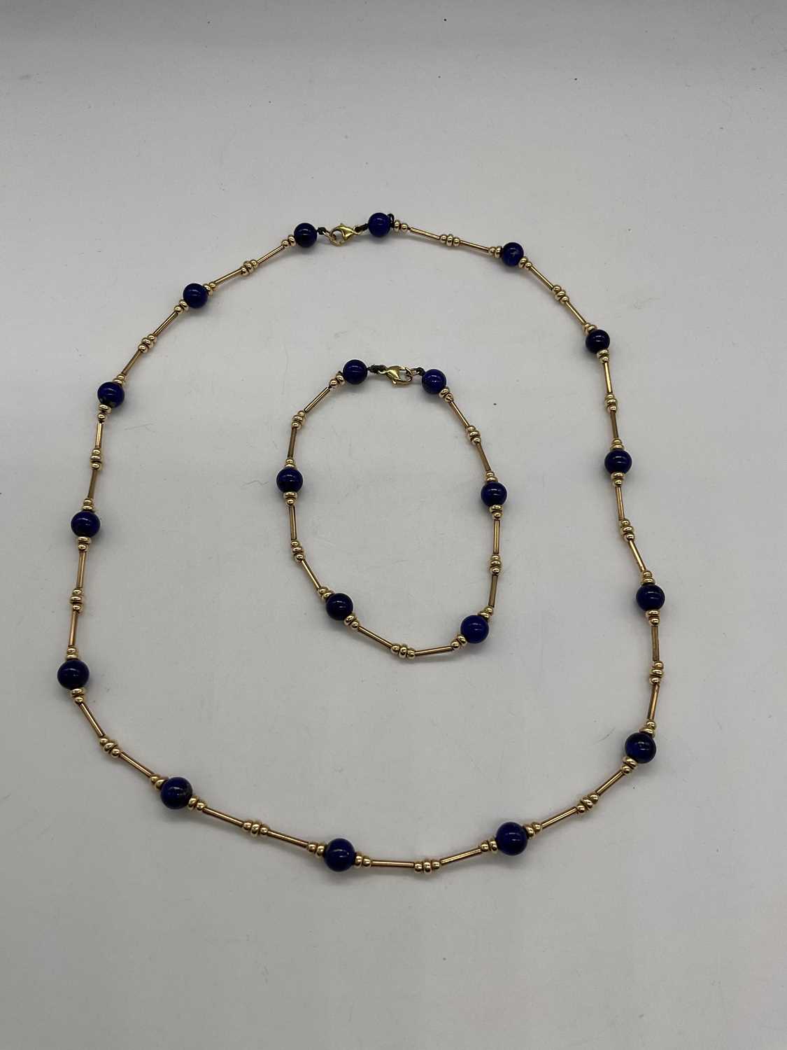 A 9ct yellow gold chain and bracelet set with bead spacers and blue roundels, necklace length - Image 2 of 3