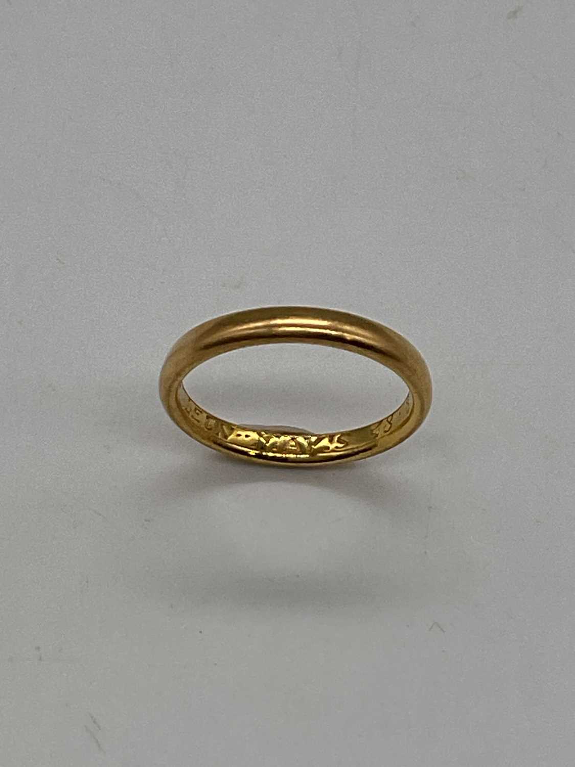 A yellow metal wedding band with inscription engraved to the inner band, size L, approx. 3.4g. - Image 2 of 3