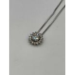 A fine 18ct white gold diamond pendant, the central round brilliant cut stone weighing 2.01cts (