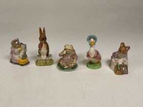 Five Royal Doulton and Beswick Beatrix Potter character figures.