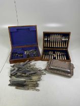 A quantity of silver plated items to include two canteens of cutlery and assorted flatware.
