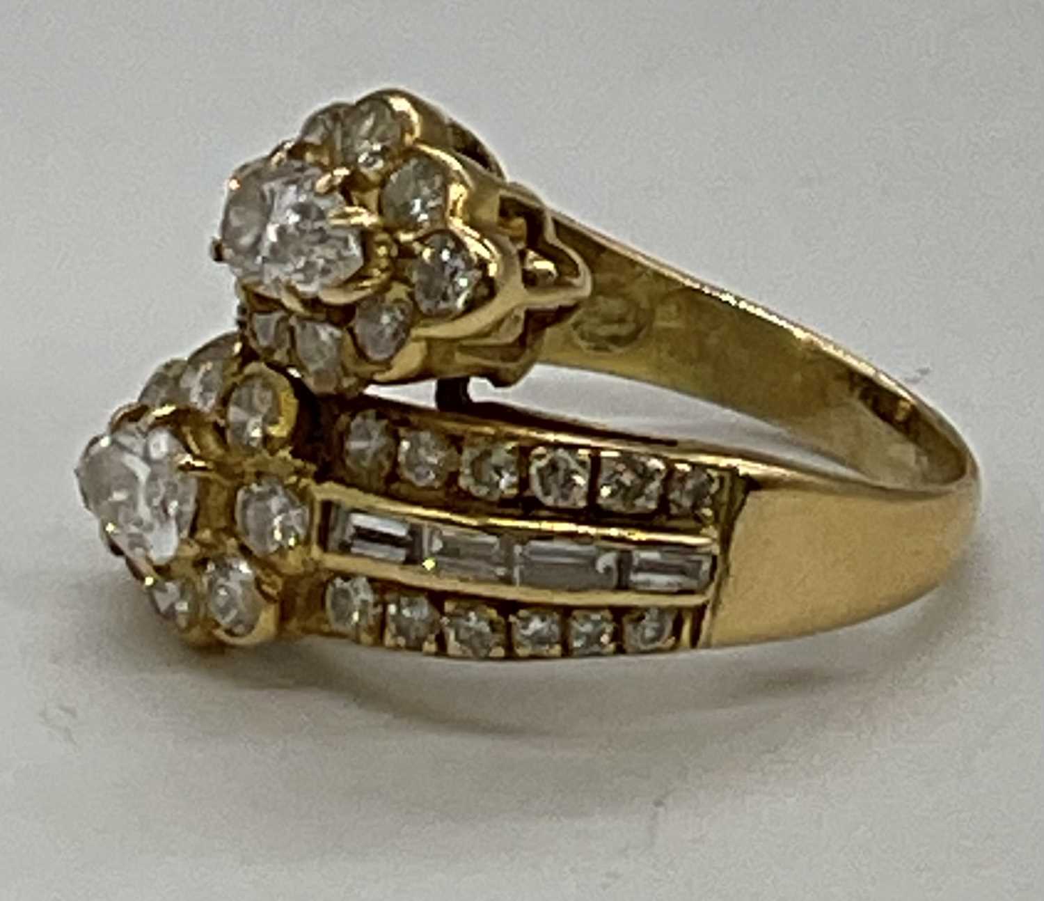 A yellow metal and diamond set crossover ring, each main section set with a pear shaped diamond each - Image 6 of 6