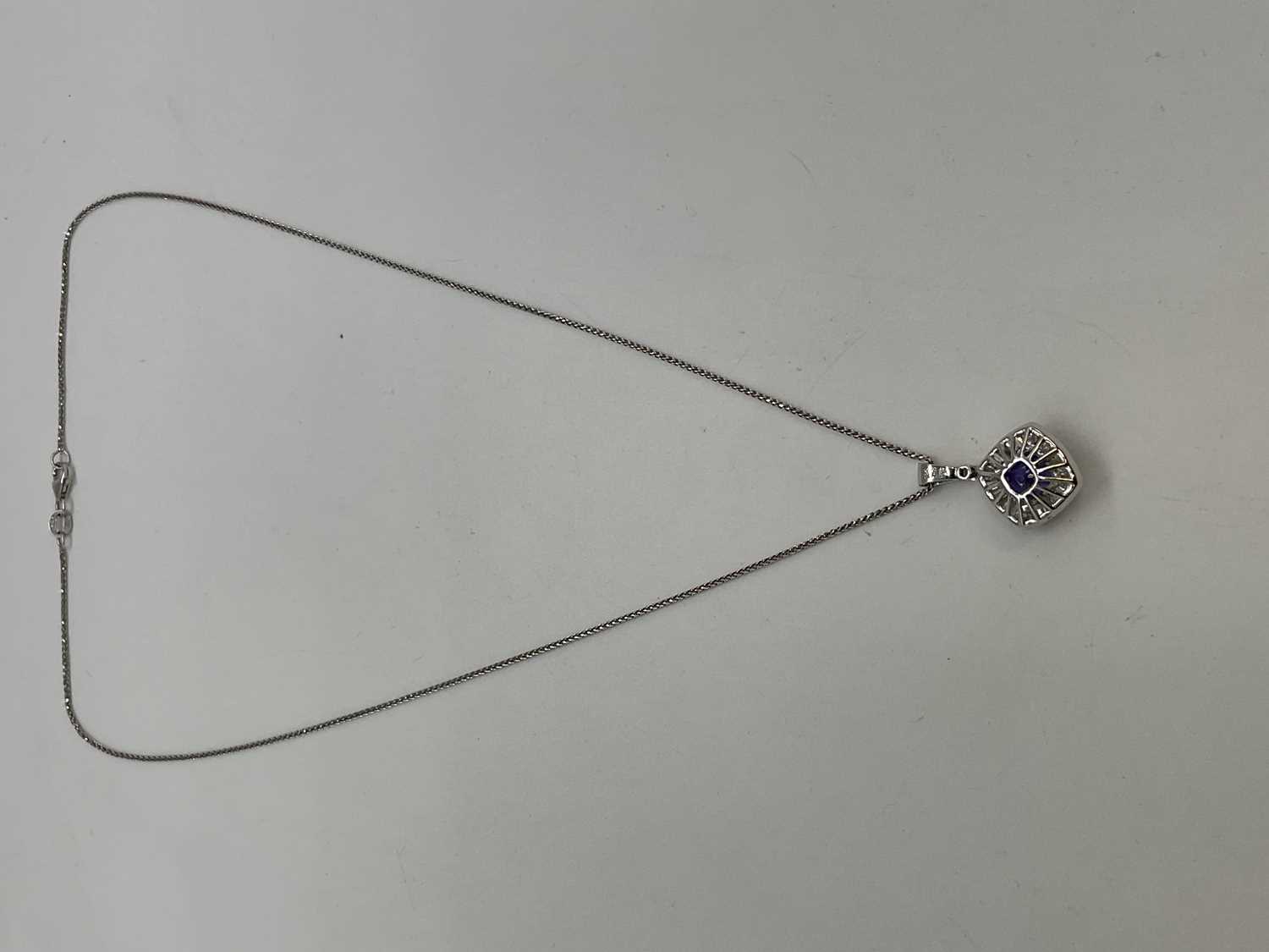 An 18ct white gold diamond and tanzanite pendant, the cushion cut tanzanite weighing 2.57cts - Image 4 of 4