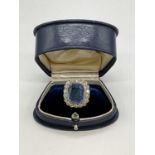 An important French 1920s Art Deco platinum cornflower blue sapphire and diamond ring, the central