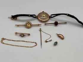 A group of yellow metal and gold jewellery, also a wristwatch with presentation inscription.